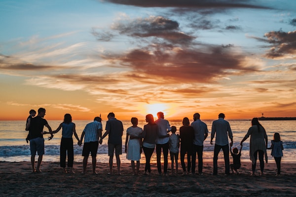Family gathered around grandmother sharing stories